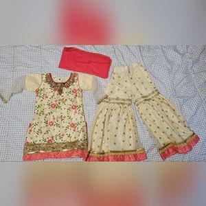 Indian pakistani girl suit glared pants and kurta tunic